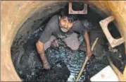  ?? AFP FILE ?? Eradicatio­n of manual scavenging is part of the BJP government’s Swachh Bharat Abhiyan.