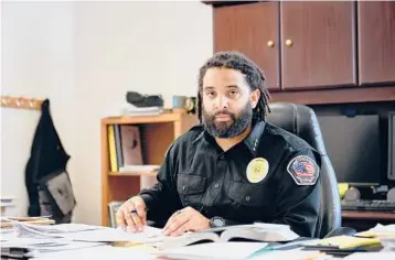  ?? CALEB ALVARADO/THE NEW YORK TIMES ?? Aaron Appelhans is the first Black sheriff in Wyoming’s history. His appointmen­t is seen as symbolic for the Mountain West, which has been insulated from much of the national reckoning over race and policing.