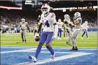  ?? Nic Antaya / Getty Images ?? The Buffalo Bills’ Stefon Diggs celebrates after scoring a touchdown against the Detroit Lions during the fourth quarter Thursday at Ford Field in Detroit.