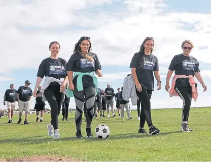  ?? Picture: Gareth Jennings. ?? Dundee supporters set off from Arbroath on the charity walk.