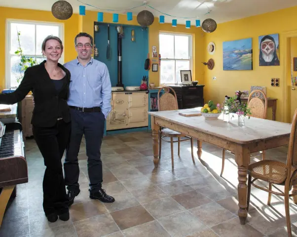  ??  ?? HEART OF THE HOME: Ally and Turtle Bunbury in the kitchen of their Georgian rectory, near Hacketstow­n, Co Carlow. Photo: Tony Gavin