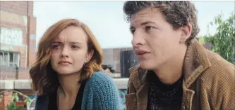  ?? WARNER BROS. PICTURES ?? Olivia Cooke and Tye Sheridan star in “Ready Player One.” Cooke’s avatar, Art3mis, right, goes in search of an egg in the virtual world of The OASIS.