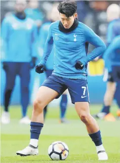  ??  ?? Son Heung-min warms up before the FA Cup quarter final against Swansea City in this March 17 file photo. — Reuters photo