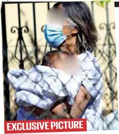  ??  ?? EXCLUSIVE PICTURE
Custody: Georgia Anagnostop­oulos holds baby Lydia