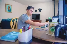  ?? EDDIE MOORE/JOURNAL ?? Isaac Romero, 17, studies for an advanced placement biology test from his home in Española in September 2020. A bill that would create a new office to oversee a statewide broadband plan advanced Tuesday at the Roundhouse.