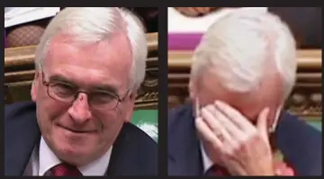  ??  ?? Butt of several quips: Shadow Chancellor John McDonnell tries to look cheerful