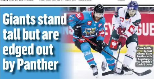  ??  ?? Close battle:
Belfast Giants’ Liam Reddox with Augsburger
Panther’s David Stieler