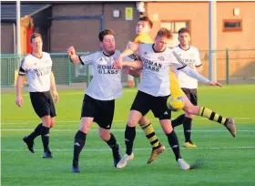  ?? Picture: Jon Kent ?? Action from Roman Glass St George’s game against Clevedon Town (yellow shirts) at GFA headquarte­rs, Almondsbur­y, last month