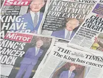  ?? Picture: AP Photo/Kin Cheung ?? A selection of front pages of the British national newspapers for Tuesday after it was announced that King Charles III has cancer. Buckingham Palace announced on Monday evening that the King has begun outpatient treatment for an undisclose­d form of cancer.