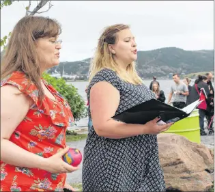  ?? BETH PENNEY/THE TELEGRAM ?? The Boogie Babes, Lesley Dove Smith and Claire Hewlett, busk for the Regatta crowds.