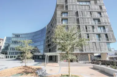  ??  ?? HOT PROPERTY: A two-bedroom corner unit at the No. 2 Silo developmen­t at the V&A Waterfront is on sale for R18 million. The features include access to a rooftop pool and braai area, secure parking and a concierge service.
