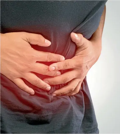  ??  ?? Symptoms such as stomach pain could lead your doctor to refer you to a specialist for a colonoscop­y.