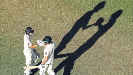  ?? Picture: Getty. ?? Dawid Malan celebrates his century with Jonny Bairstow.