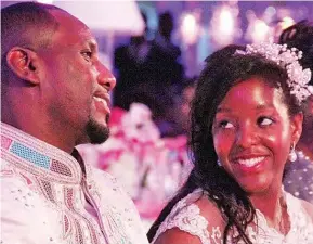  ?? ?? WELL-OFF:
Bona and Chikore on their wedding day