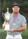  ?? Gregory Shamus / Getty Images ?? Bryson DeChambeau celebrates after winning the 120th U.S. Open Championsh­ip on Sunday at Winged Foot Golf Club in Mamaroneck, N.Y.