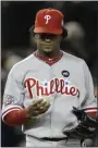  ?? DAVID J. PHILLIP — THE ASSOCIATED PRESS ?? The Phillies’ Pedro Martinez looks at the ball after giving up a two-run home run to Yankees’ Hideki Matsui during Game 6 of the 2009 World Series.