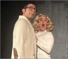  ?? MARIN MUSICAL THEATRE COMPANY ?? Lorenzo Alviso and Jenny Boynton are the innocent couple corrupted by sin and science in Marin Musical Theatre Company’s “The Rocky Horror Show.”