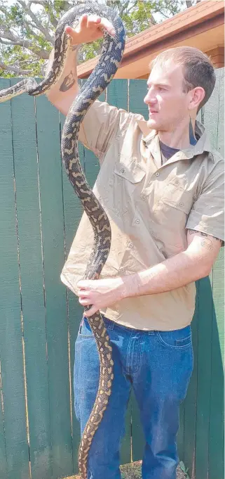  ?? Picture: Contribute­d ?? SNAKE ‘HISSTORY’: Snake catcher Anthony Adams has a long history with the reptiles, having owned many as pets. .