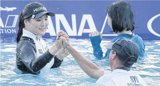  ?? AFP ?? Ryu So-Yeon celebrates with her caddie Tom Watson in Poppie’s Pond after winning the title at the ANA Inspiratio­n.