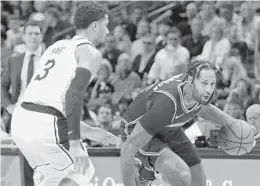  ?? JOHN MCCALL/SUN SENTINEL ?? James Johnson’s season debut for the Heat was shortened because of early foul trouble.