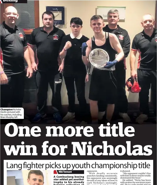  ??  ?? ChampionNi­cholas Devlin pictured with his coaches, including Brian Murphy, left