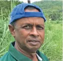  ?? Shratika Naidu ?? Ramesh Chandra couldn’t go home as the crossing behind him at Urata, Labasa was underwater on January 28, 2021. Photo: