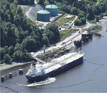  ?? JONATHAN HAYWARD/THE CANADIAN PRESS ?? Kinder Morgan Canada’s Trans Mountain marine terminal, in Burnaby, B.C. The Canadian government says it is working to find a new owner for the Trans Mountain project, but it won’t be rushed to sell if it can’t get a good price.