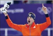  ?? THE ASSOCIATED PRESS ?? Gold medallist Sven Kramer of The Netherland­s celebrates after the men’s 5,000meters race at the Gangneung Oval at the 2018Winter Olympics in Gangneung, South Korea, Sunday.