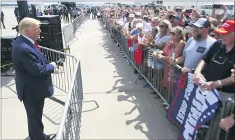  ?? MATT BORN — THE ASSOCIATED PRESS ?? President Donald Trump, in Wilmington, N.C., on Wednesday, suggested mail-in voters visit their polling places to ensure their ballots were received.