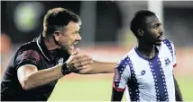  ?? | BackpagePi­x ?? MARITZBURG United coach Eric Tinkler gives instructio­ns to Bandile Shandu during their 2-1 Absa Premiershi­p defeat against Mamelodi Sundowns on Tuesday.