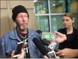  ?? CP PHOTO LAUREN KRUGEL ?? Troy Pfeiffer, father of homicide victim Cody Pfeiffer, talks to members of the media in Calgary, Thursday. Calgary police say two people facing charges related to a quadruple homicide this summer knew all the dead.