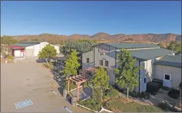  ??  ?? Agua Dulce winery, located on Sierra Highway in Santa Clarita, is up for sale. The estate includes a vineyard that produces six grape varietals, a ranch for livestock, a 4,400-square-foot home and a 1,100-square-foot guest house. The price tag is $12.8...