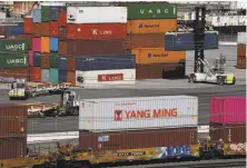  ?? Mark Ralston / AFP / Getty Images ?? Washington trade officials say discussion­s with China are going well as the U.S. seeks to beat a deadline for a trade deal.