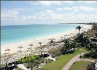  ?? Betsa Marsh/postmedia News ?? The Turks and Caicos Islands, popular with tourists, are where two Canadians accused of fraud are seeking political asylum after telling the court they feared being killed if they return to Canada.