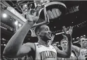  ?? [MATT SLOCUM/THE ASSOCIATED PRESS] ?? Villanova’s Phil Booth celebrates after a game against Xavier on Wednesday in Philadelph­ia.