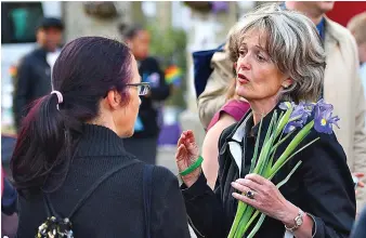  ??  ?? Under pressure: Council leader Elizabeth Campbell at a Grenfell Tower vigil