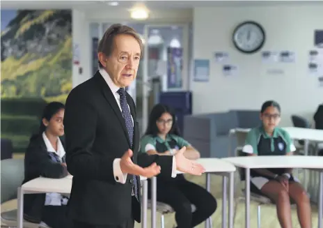 ?? Pawan Singh / The National ?? Sir Anthony Seldon, one of Britain’s top private school head teachers, and the biographer of the UK’s past five prime ministers, with pupils during his visit to the Gems Education Wellington Internatio­nal School in Dubai