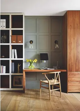  ??  ?? STUDY
Running a business means a home office is essential. Fitted furniture (left) keeps the look streamline­d and a dark scheme of grey and walnut makes this a calm space that encourages focus.
Fitted cupboards and storage
in walnut and painted...