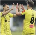  ?? ?? Wellington Phoenix players Kosta Barbarouse­s, left, and Ben Old are likely to feature at some stage for the All Whites against Egypt.