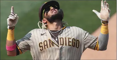  ?? Associated Press ?? Celebratin­g: San Diego Padres' Fernando Tatis Jr. celebrates after hitting a solo home run against the Oakland Athletics during the seventh inning of a baseball game in Oakland, Calif., in this Sunday, Sept. 6, 2020, file photo.