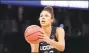  ?? John Raoux / Associated Press ?? UConn’s Olivia NelsonOdod­a, above, along with Christyn Williams were chosen to train this week with the USA Basketball Women’s National Team.