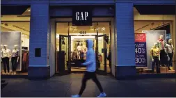  ?? Patrick T. Fallon / Bloomberg ?? Synchrony’s card partnershi­p with Gap Inc. will end in 2022 after the companies were unable to agree on a program renewal.