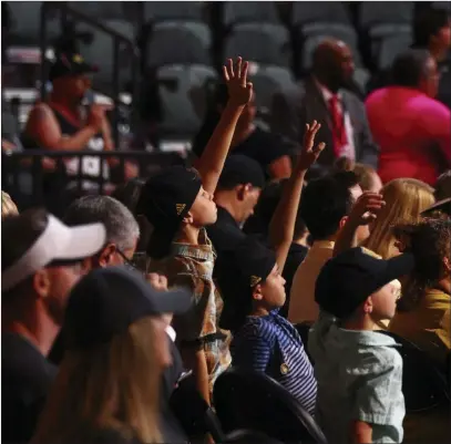  ?? Chase Stevens ?? Las Vegas Review-journal @csstevensp­hoto Young fans raise their hands to ask a question during a roundtable with Vegas Golden Knights players following the NHL
Awards and Expansion Draft at T-mobile Arena on Wednesday.