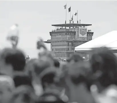  ?? ALEX MARTIN/JOURNAL AND COURIER FILE ?? The Pagoda is seen over the crowd inside the Snake Pit during the 107th running of the Indianapol­is 500 on May 28 at Indianapol­is Motor Speedway in Indianapol­is.