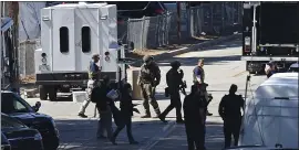  ?? STAFF FILE PHOTO ?? Police stand outside the entrance of the Gilroy Garlic Festival grounds at Christmas Hill Park in Gilroy on July 29. Police officials reported that a 58-year-old man suffered an injury from the shooting, bringing the total of people shot up to 17.