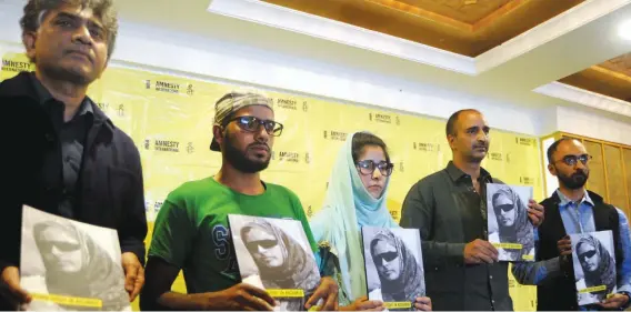  ??  ?? Victims of pellet firing at a press briefing organised by Amnesty Internatio­nal in Srinagar in September. Many of these, who lost their vision permanentl­y, are now learning Braille.