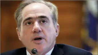  ?? JACQUELYN MARTIN — THE ASSOCIATED PRESS FILE ?? Veterans Affairs Secretary David Shulkin speaks during a House Committee on Veterans’ Affairs hearing on veteran caregiver support on Capitol Hill in Washington. Shulkin is hanging onto his job by a thread. He faces an insurgency from within his...