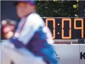  ?? JOHN MINCHILLO/AP ?? Opening day will feature big changes for baseball. One change will be the use of a pitch clock to speed up games.