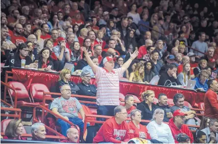  ?? ROBERTO E. ROSALES/JOURNAL ?? A UNM fan argues a call in the Pit during Saturday night’s game against Wyoming. The Lobos said they could feel a different vibe for that game from the 12,501 fans in attendance.