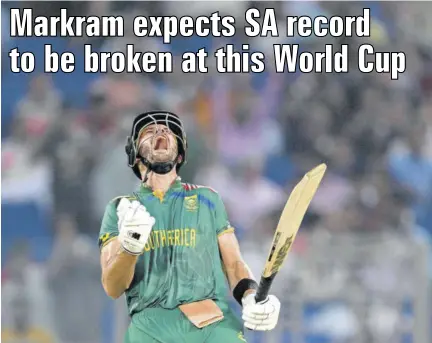  ?? (Photo: AFP) ?? South Africa’s Aiden Markram celebrates after scoring a century during their ICC Men’s Cricket World Cup match against Sri Lanka at the Arun Jaitley Stadium in New Delhi, India, on Saturday.